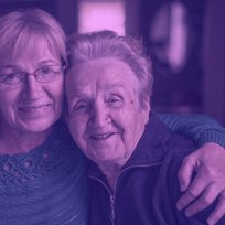 Daughter supporting elderly mother with substance abuse disorder