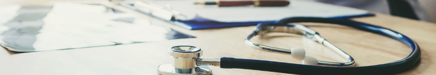 Stethoscope on table at doctor office